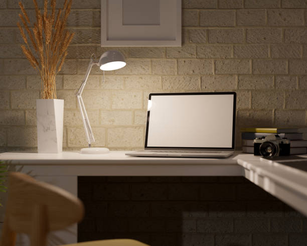 istock Close-up, Modern dark home office workspace with notebook laptop computer 1386794222