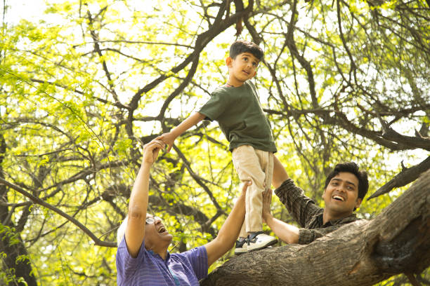 istock Three generation family having fun at park 1386802910