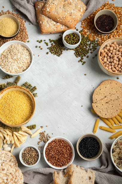 istock Best sources of carbs on light gray background. 1386806882