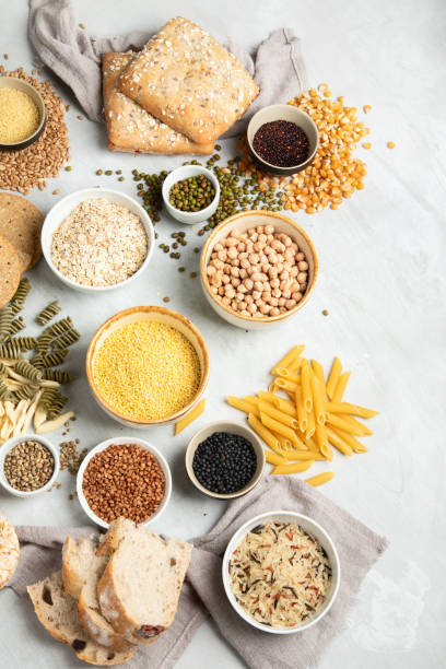 istock Best sources of carbs on light gray background. 1386806884