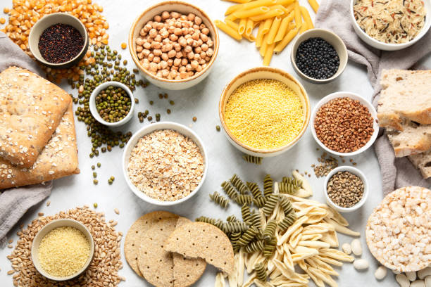 Best sources of carbs on light gray background.