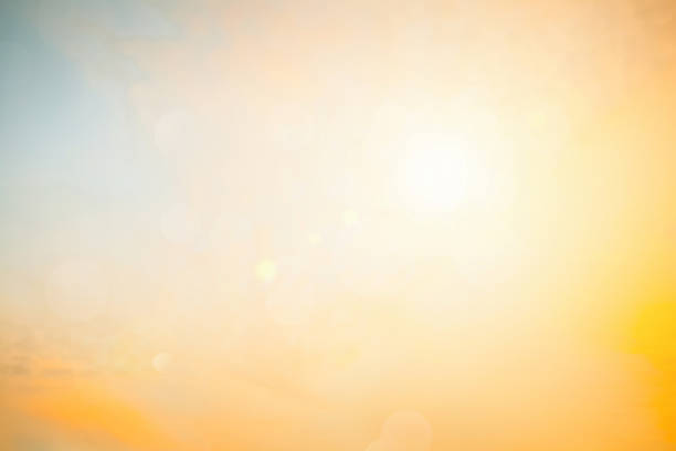 istock Relaxing outdoors vacation landscape concept: Abstract blurred sunlight beach colorful blurred bokeh background with retro effect autumn sunset sky have blue bright, white, and color orange calm. 1386807630