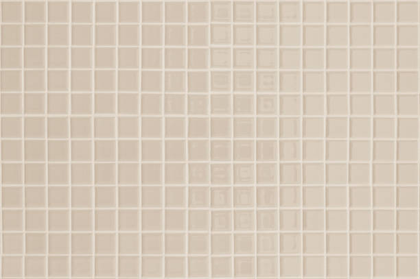 istock Pastel cream ceramic wall and floor tiles mosaic abstract background. Design geometric wallpaper texture decoration bedroom. Simple seamless pattern clean for backdrop advertising banner poster or web. 1386807704