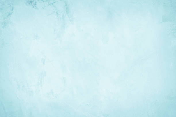 istock Pastel Blue and White concrete stone texture for background in summer wallpaper. Cement and sand wall of tone vintage. Concrete abstract wall of light cyan color, cement texture mint green for design. 1386808362