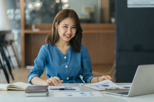 istock Beauitul young woman working using computer laptop concentrated and smiling 1386808475