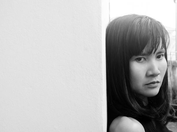 istock Stressed woman black and white close up. 1386809754