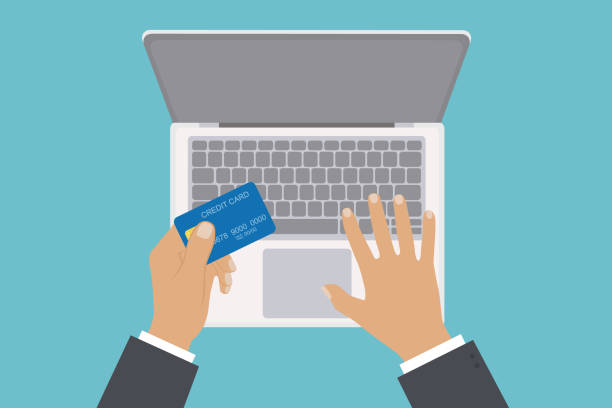 istock Online Shopping Concept With Businessman Holding Credit Card. 1386813470