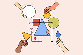 istock Diverse people team connect geometric shapes 1386816859