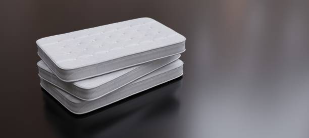 istock Bed Mattress stack isolated on gray. Three single mattress white color. 3d render 1386819145