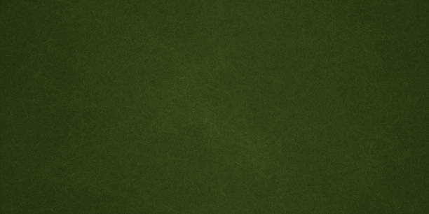istock Elegant dark emerald green background with black shadow border and old vintage grunge texture design 1386821367