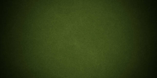 istock Elegant dark emerald green background with black shadow border and old vintage grunge texture design 1386821387
