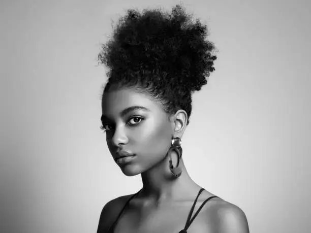 Photo of Beauty portrait of African American girl with afro hair