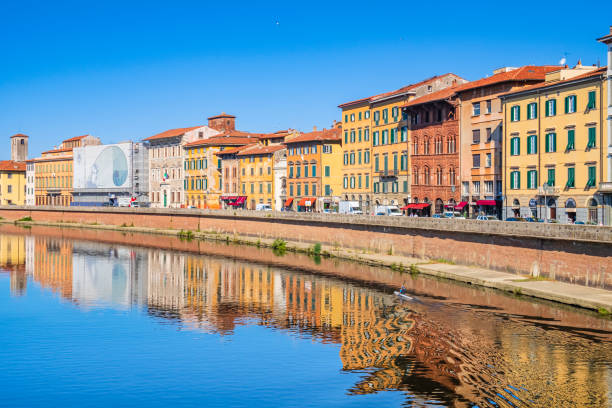 Pisa, Lungarno Pacinotti (Tuscany, Italy) City life in Pisa along the Lungarno Pacinotti, one of the streets along the Arno river bordered by historic buildings. 2667 stock pictures, royalty-free photos & images
