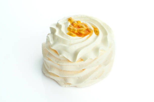 istock Pavlova cake with passion fruit on a white background 1386826996