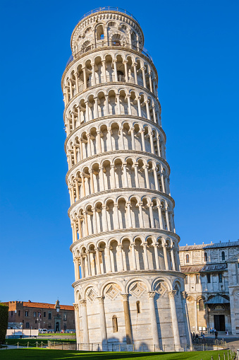 Leaning Tower of Pisa, one of the monumental buildings in the famous Piazza dei Miracoli, formally known as Piazza del Duomo, listed as a UNESCO World Heritage Site since 1987