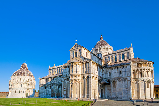 Piazza dei Miracoli, formally known as Piazza del Duomo, is the iconic artistic center of Pisa, listed as a UNESCO World Heritage Site since 1987