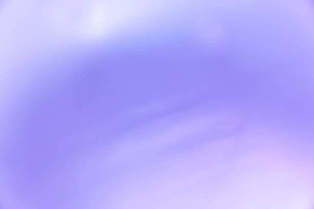 Dark Purple blurred background. Image close up out of focus from balloon. Art design pattern. Glitter abstract with elegant bright gradient design.