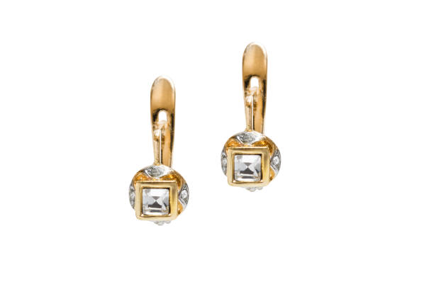 istock Gold earrings isolated 1386831746