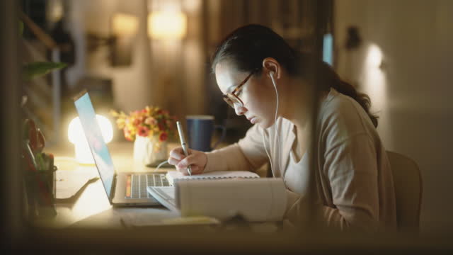 Asian Student learning at night