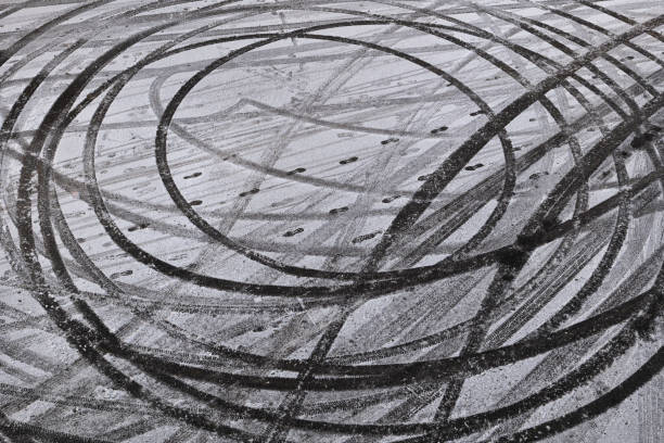 istock Abstract Car Drift Skid Marks In Winter 1386836230