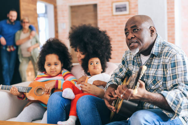 istock Grandpa plays guitar 1386836674