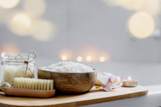 Hotel spa treatment or home bath procedure. Bathroom with accessories on tray