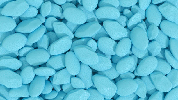 istock Pebbles background blue color stones 1386847715