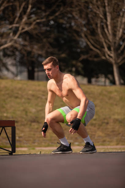 istock Male is getting ready to jump 1386851545