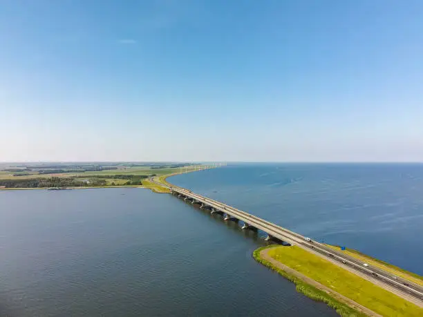 Ketelbrug overhead drone view with the A6 highway. The bridge is located between the Ketelmeer and Ijsselmeer in Flevoland, The Netherlands