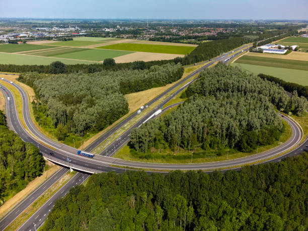 istock Highway junction aerial view during springtime 1386853972