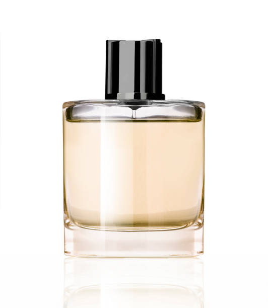 istock Perfume orange bottle isolated on white background 1386854593