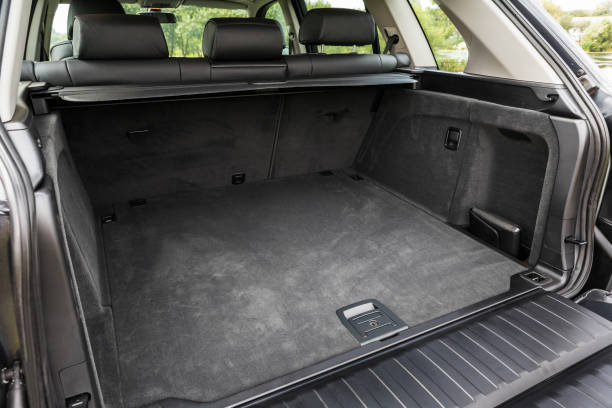 istock large open trunk of modern car 1386855346
