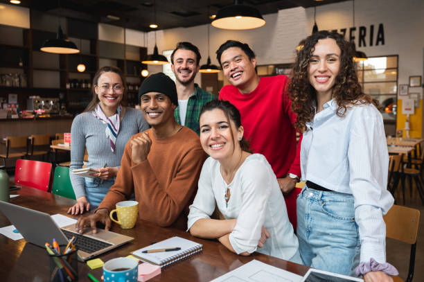 istock Young and succesfull mixed race people looking at camera. Teamwork or students cooperation. 1386856051