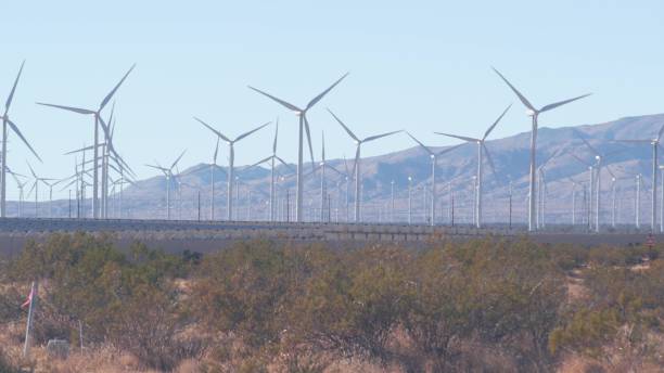 windmills on wind farm, wind mill energy generators. desert windfarm, usa. - tehachapi imagens e fotografias de stock