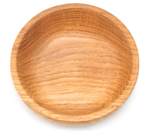 istock empty wooden bowl isolated on white background. clipping path 1386857442