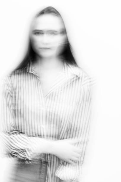 istock Abstract woman portrait with motion blur 1386857560