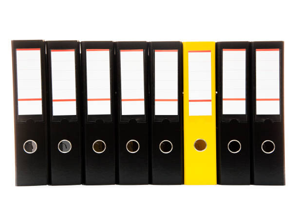 istock row of folders for papers and documentation on a shelf in the office 1386858733