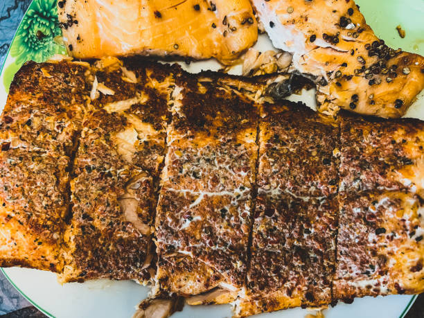 istock Spiced salmon on a plate. 1386862882