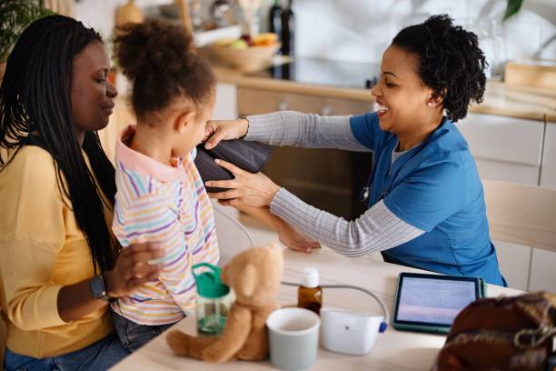 istock Young patient getting blood pressure checked by paediatrician 1386866423
