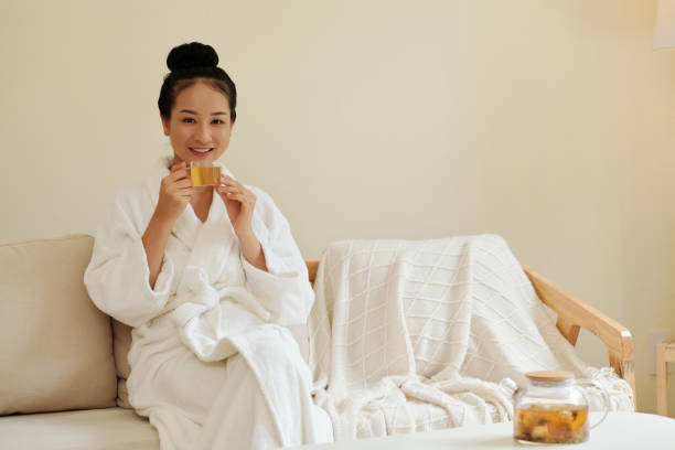 istock Woman Drinking Tea After Bath 1386869960