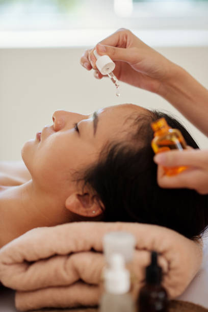 istock Beautician Applying Anti-Aging Serum 1386870031