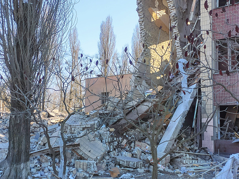 Kharkiv, UKRAINE -March 16, 2022: Russia war against Ukraine. Russian bomb hit the school.