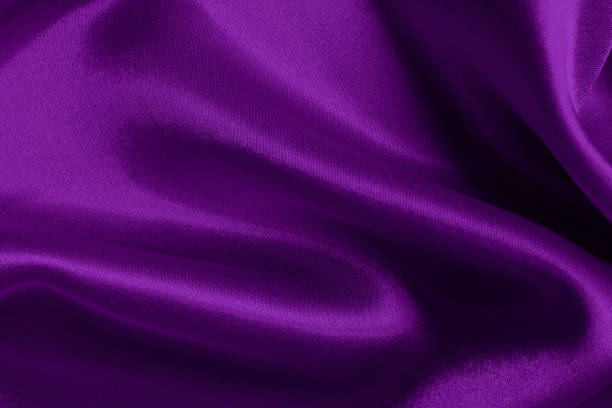 istock Purple fabric cloth texture for background and design art work, beautiful crumpled pattern of silk or linen. 1386872538