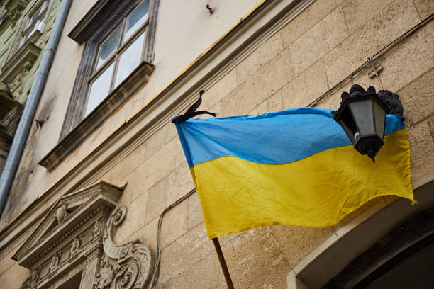 istock Ukrainian flag in city. Lviv during war 1386874385