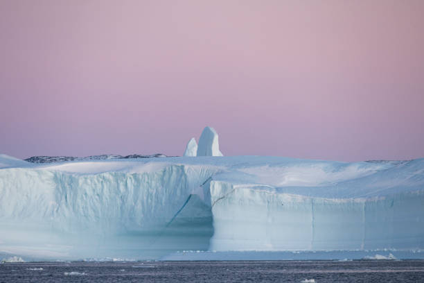 istock ICEBERGS FLOATING OVER SEA, TEXTURES AND COLORS 1386875816