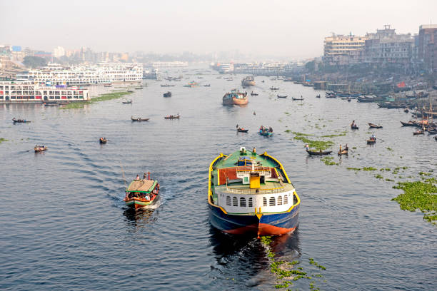 The busy water transportation of Buriganga River, Dhaka, Bangladesh stock photo