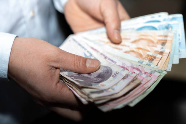 istock turkish lira and coin 1386877248