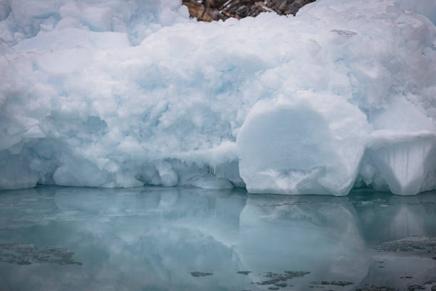 istock big icebergs floating over sea, textures and forms 1386878325