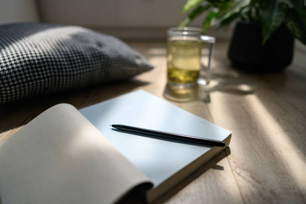 istock Tea and a book in the afternoon 1386881339