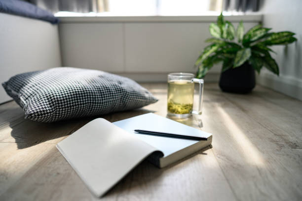 istock Tea and a book in the afternoon 1386881342